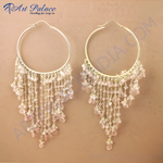 Load image into Gallery viewer, Gold hoop earrings with cascading strands of light pink gemstones, creating a beautiful dangle effect.