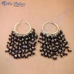 Load image into Gallery viewer, Silver hoop earrings with a cascade of dark red garnet beads, perfect for women.