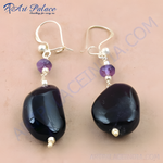 Load image into Gallery viewer, Amethyst drop earrings with 925 sterling silver hooks and accents. Features polished, natural purple amethyst gemstones.