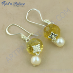 Load image into Gallery viewer, 925 sterling silver drop earrings with faceted yellow citrine gemstones and white pearl accents.