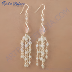 Load image into Gallery viewer, 925 sterling silver chandelier earrings with moonstone beads and pear-shaped accents.