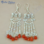 Load image into Gallery viewer, 925 sterling silver chandelier earrings with white gemstone beads and vibrant red carnelian gemstone drops