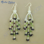 Load image into Gallery viewer, 925 sterling silver chandelier earrings with garnet and peridot gemstones.