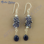 Load image into Gallery viewer, Sterling silver drop earrings featuring clusters of iolite gemstones and pear-shaped drops in a deep blue hue
