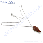 Load image into Gallery viewer, Sterling silver fish pendant necklace with brown gemstone, elegant and stylish design.