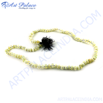 Load image into Gallery viewer, A close-up shot of a gemstone bead necklace on a white background. The necklace features round beads.