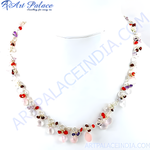Load image into Gallery viewer, A stunning gemstone beaded necklace crafted from 925 sterling silver. Features red, pink and purple gemstones on a white background.