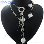 Load image into Gallery viewer, Gold chain necklace with black and white stones displayed on a black mannequin, perfect for women