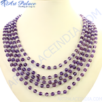 Load image into Gallery viewer, Amethyst beaded necklace with vibrant purple gemstone beads on display, a beautiful women's jewelry piece.