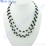 Load image into Gallery viewer, Elegant black beaded necklace on a white display stand, perfect for women's fashion jewelry.