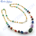 Load image into Gallery viewer, Multi-gemstone beaded necklace with sterling silver chain and clasp, featuring a variety of colorful stones.