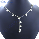 Load image into Gallery viewer, Sterling silver Y necklace with multiple white pearls displayed on a mannequin