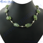 Load image into Gallery viewer, A stunning green jade and pearl beaded necklace displayed on a black mannequin.