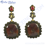 Load image into Gallery viewer, Ruby and sapphire gemstone dangle earrings with intricate detailing, ideal for women