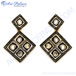 Load image into Gallery viewer, Black rhodium diamond dangle earrings with sparkling white diamonds on a white background.