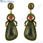 Load image into Gallery viewer, Gold-plated drop earrings with a large faceted sapphire and ruby accents.
