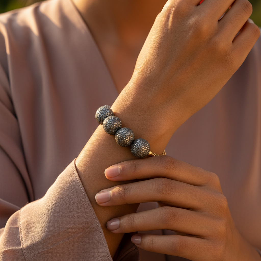 Close up of a cluster of sparkly stone orb beads for jewelry making, with a textured surface