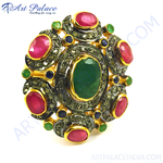 Load image into Gallery viewer, Gold ring with oval emerald center, ruby and diamond accents.