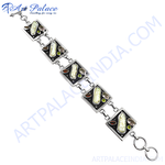 将图像加载到图库查看器中, Sterling silver chain bracelet with square links inlaid with gemstones and mother of pearl accents against a white background.