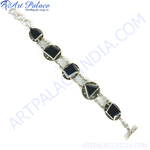 将图像加载到图库查看器中, Sterling silver chain bracelet with various shaped black onyx stones, a toggle clasp, and a white background.