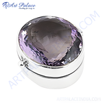 Load image into Gallery viewer, Sterling silver ring featuring a large, oval-cut amethyst gemstone. The ring is highly polished and suitable for any occasion.