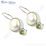 Load image into Gallery viewer, Sterling silver drop earrings with white pearls and green peridot gemstones.