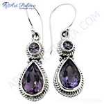 Load image into Gallery viewer, 925 sterling silver drop earrings featuring pear-shaped and round purple amethyst gemstones.
