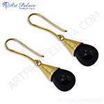 Load image into Gallery viewer, Gold teardrop drop earrings with black onyx gemstones, perfect for women.
