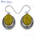 Load image into Gallery viewer, 925 sterling silver dangle earrings featuring olive green gemstones in a textured design