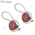 Load image into Gallery viewer, Sterling silver dangle earrings with a round pink gemstone set in a polished bezel, elegant and eye-catching.