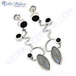Load image into Gallery viewer, Sterling silver dangle earrings with moonstone and black onyx gemstones, perfect for any occasion.