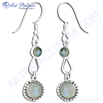 Load image into Gallery viewer, Sterling silver drop earrings with moonstone gemstones, featuring a delicate design and hook closure.