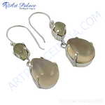 Load image into Gallery viewer, Sterling silver dangle earrings with pear-shaped moonstone gemstones. Silver earrings for women.