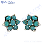 Load image into Gallery viewer, Sterling silver stud earrings featuring turquoise gemstones arranged in a floral pattern.