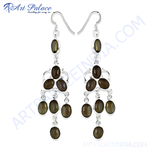 Load image into Gallery viewer, 925 sterling silver chandelier earrings featuring oval olive gemstones hanging from silver chains.