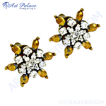 Load image into Gallery viewer, Gold floral stud earrings with clear cubic zirconia stones. Elegant women's jewelry.