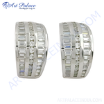 Load image into Gallery viewer, Silver hoop earrings with baguette-cut cubic zirconia stones. Elegant and sparkling design for women.