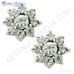 Load image into Gallery viewer, Floral stud earrings featuring round cubic zirconia stones set in a silver metal setting, perfect for women.