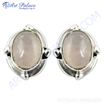Load image into Gallery viewer, 925 sterling silver stud earrings with oval rose quartz gemstone. Pink gemstone jewelry for women.