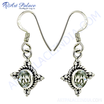 Load image into Gallery viewer, 925 sterling silver drop earrings with gemstone center, showcasing a detailed design.