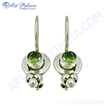 Load image into Gallery viewer, 925 sterling silver dangle earrings with round peridot gemstones.