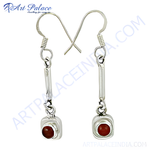 Load image into Gallery viewer, Sterling silver drop earrings featuring red gemstones, perfect for any occasion.