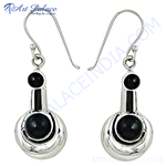Load image into Gallery viewer, 925 sterling silver dangle earrings with large, round black onyx gemstones and a polished finish.