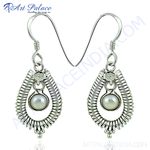 Load image into Gallery viewer, 925 sterling silver teardrop earrings with a pearl center and a textured design, suitable for women