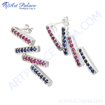 Load image into Gallery viewer, 925 sterling silver dangle earrings with alternating ruby and sapphire gemstones