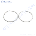 Load image into Gallery viewer, Sterling silver hoop earrings with textured detail on a white background, perfect for daily wear.