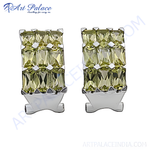 Load image into Gallery viewer, Silver stud earrings with yellow gemstones, perfect for any occasion.