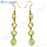 Load image into Gallery viewer, Gold dangle earrings with light green peridot gemstones, perfect for any occasion.