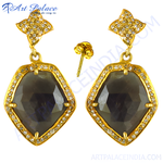 Load image into Gallery viewer, Gold teardrop dangle earrings with sapphire gemstones and diamond accents, perfect for women.