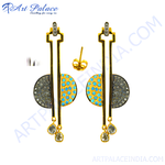 Load image into Gallery viewer, Gold dangle earrings featuring blue gemstones and sparkling accents, perfect for women.